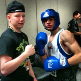 Marc Anthony Muniz, right, is pictured with trainer/coach Dan Kelly of Dorchester Boxing Club. Photo courtesy DBC